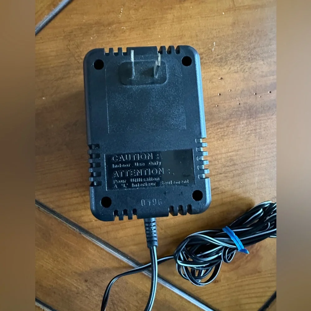 Genuine Canon AD-300S power supply input: 120V ~ 60 Hz 24W output: 13.5V 1.0A